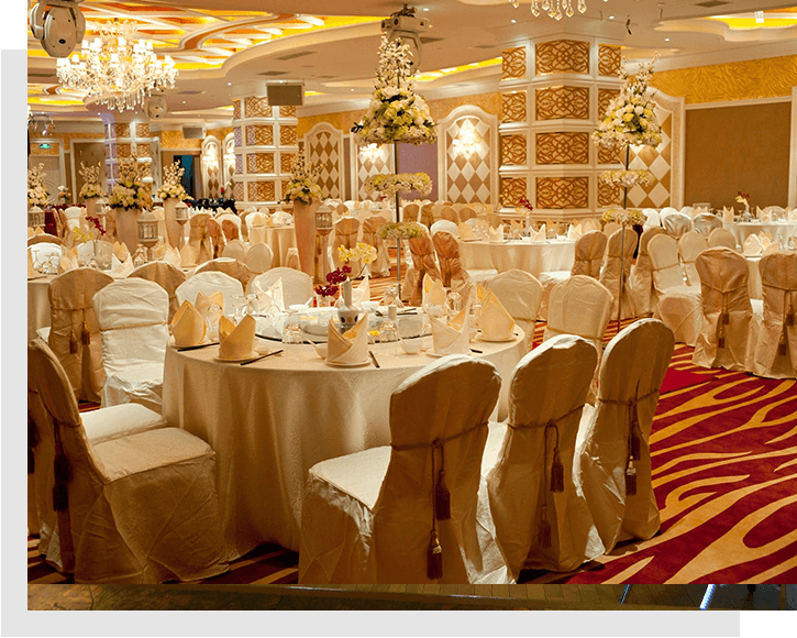 A banquet hall with many tables and chairs.