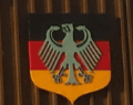 Here's an alt tag for the image: German coat of arms on shield.