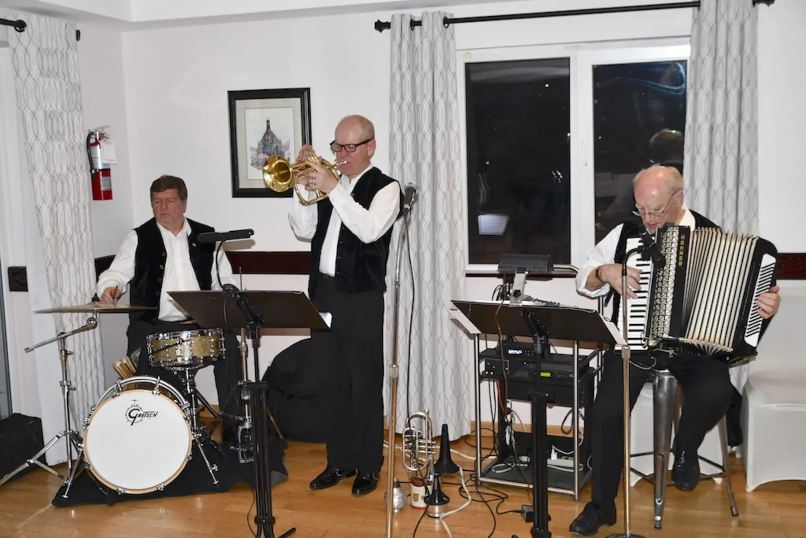 Small jazz band playing indoors.