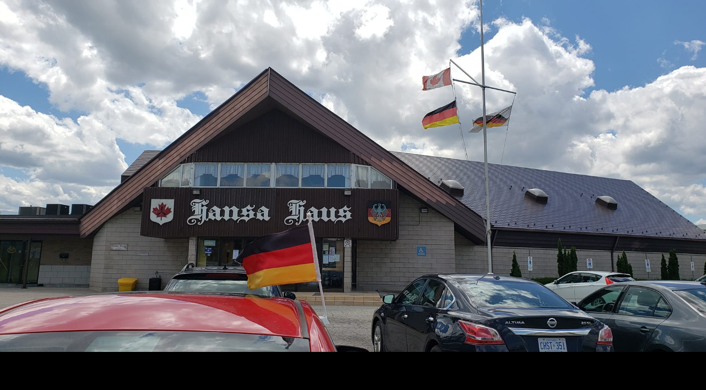 Hansa Haus restaurant with German flags.